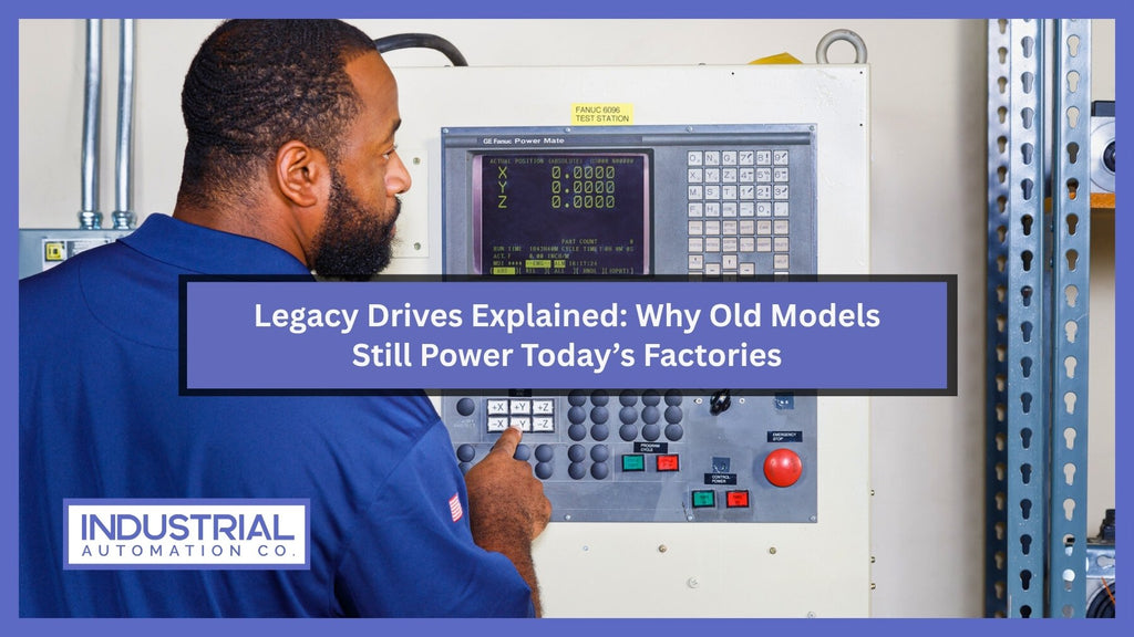 Technician operating a GE Fanuc Power Mate legacy control system inside an industrial facility. Text overlay reads: “Legacy Drives Explained: Why Old Models Still Power Today’s Factories” with Industrial Automation Co. logo.