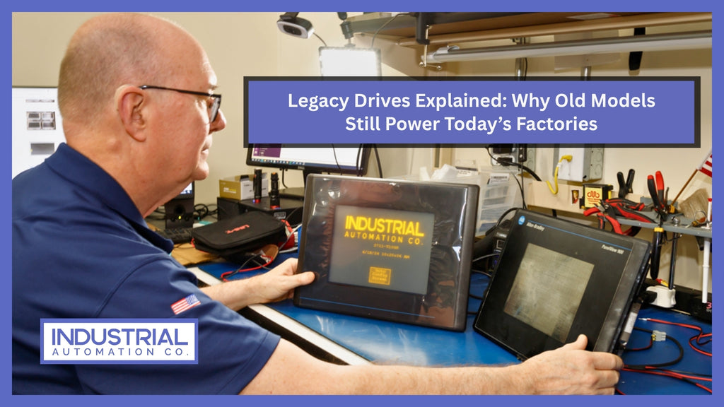 A person in a blue uniform holding two industrial drives, one branded with "Industrial Automation Co." and the other a "PowerFlex 700," in a workshop setting with tools and equipment in the background. The image has a purple border with the text "Legacy Drives Explained: Why Old Models Still Power Today's Factories" at the top and "INDUSTRIAL AUTOMATION CO." at the bottom.